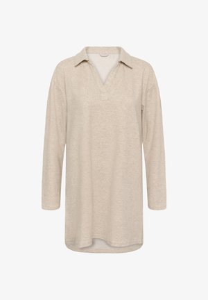 Bež pikka pikkade varrukatega kootud tunika, millel on krae ja V-kaelus, laia lõikega ning kerge kumerusega hem.