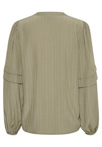 Olivgrüne Bluse mit gefaltetem Material, rundem Ausschnitt und puffärmel. Lockerer Schnitt mit elastischen Bündchen und ohne sichtbare Hardware.