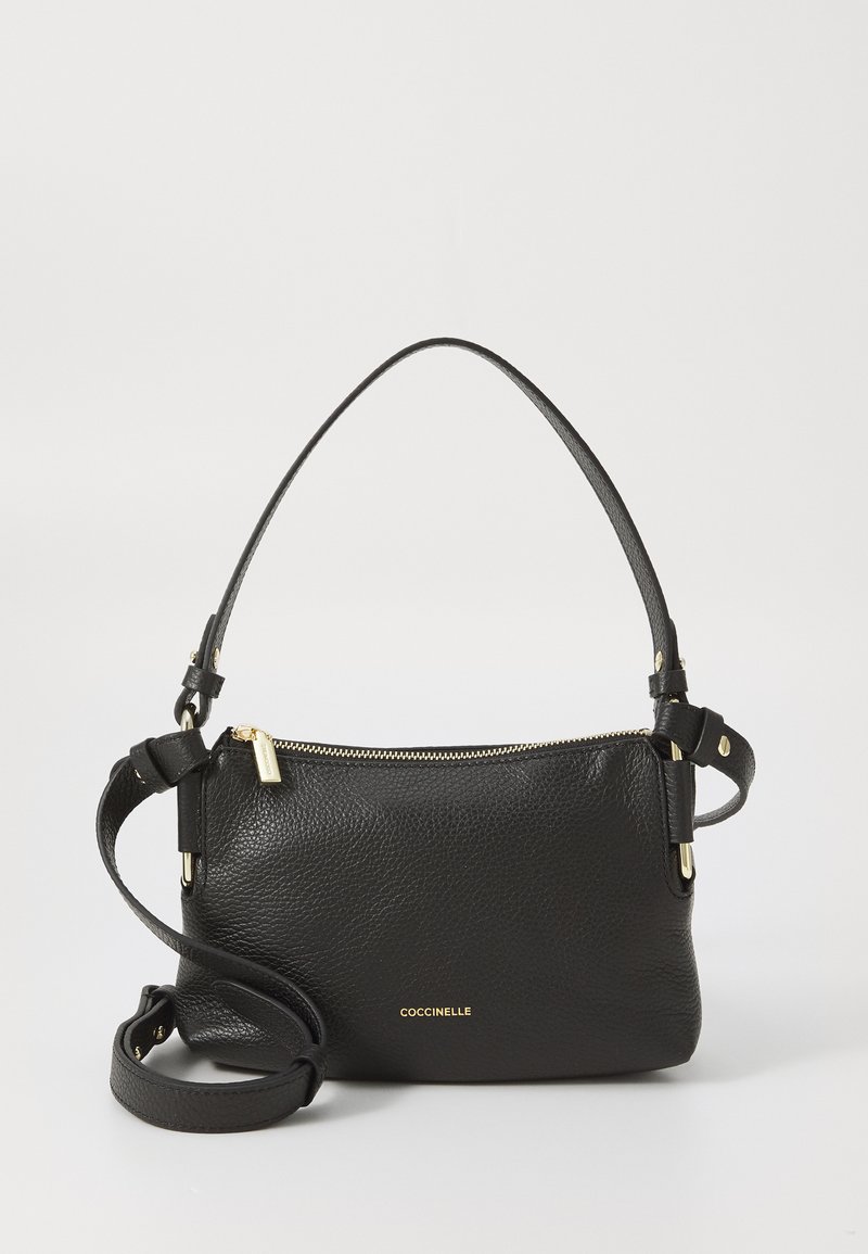 Black leather handbag with a textured surface, gold-tone hardware, zip closure, and an adjustable strap. Small size, rectangular shape.