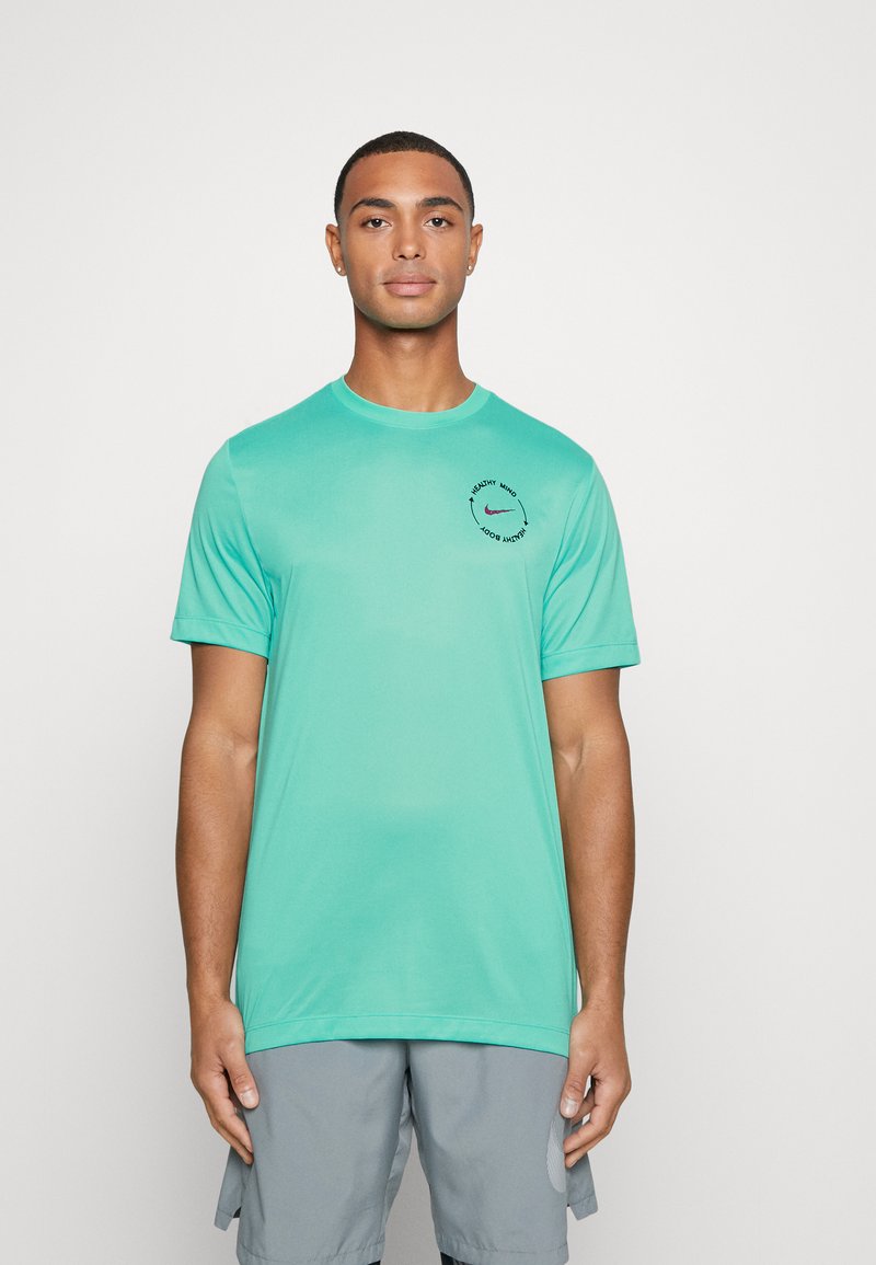 Nike Performance TEE Sports Tshirt light menta/mint Zalando.co.uk