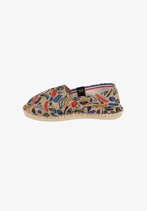 Chausson style espadrille en toile beige, présentant des motifs abstraits colorés. Semelle en corde de jute naturelle avec un bord cousu, doublure intérieure douce.
