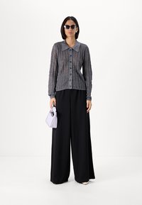 Vero Moda Tall VMLIVA SUPER WIDE PANTS - Nohavice - black