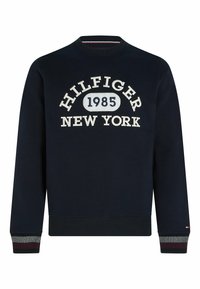 Granatowy sweatshirt z prążkowanymi mankietami i dołem, z wyszytym na przedzie napisem "HILFIGER 1985 NEW YORK" w białym kolorze.