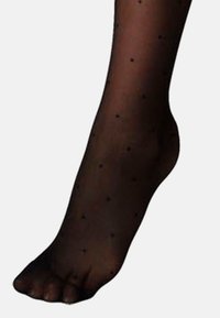 Calze nere trasparenti con un motivo a pois, con una texture liscia e un aspetto naturale del piede alla caviglia.