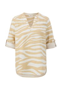 Top a maniche corte, scollato a V in beige con strisce bianche a zebra, con polsini arrotolati e orlo curvo. Realizzato in tessuto leggero.