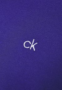 Calvin Klein Golf PLANET  - Polo - indigo