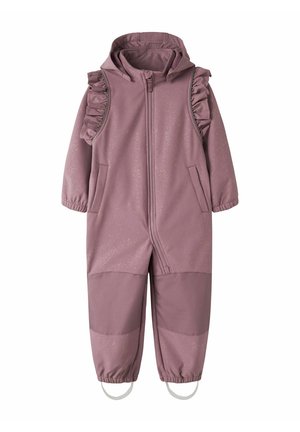 Combinaison imperméable mauve pour enfants avec capuche, fermeture éclair devant, détails à volants aux épaules, poignets élastiques, genoux renforcés, poches et sangles aux pieds.