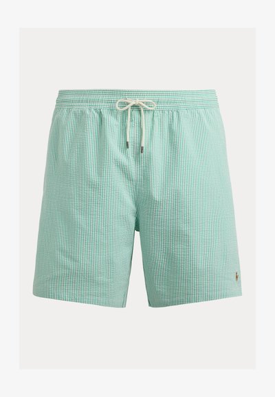 Πράσινα ανοιχτόχρωμα μπλε και λευκά ριγέ μαγιό βερμούδα με ελαστική μέση και λευκό κορδόνι, με μικρό κεντητό λογότυπο κοντά στο τελείωμα.