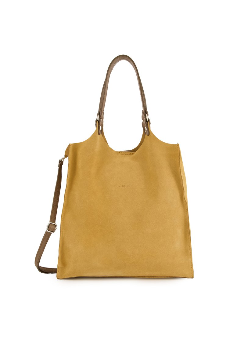 Sac fourre-tout en cuir jaune moutarde avec une texture lisse, équipé de doubles poignées et d'une bandoulière réglable. Design minimaliste, sans matériel visible.