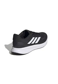 Black athletic shoe with a textured upper, featuring white three-stripe accents, lace-up design, and a contrasting white midsole.