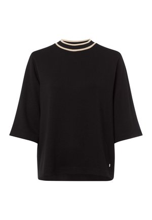 Black short-sleeve top with a round neckline featuring a contrasting cream stripe along the collar. Soft fabric with a relaxed fit.