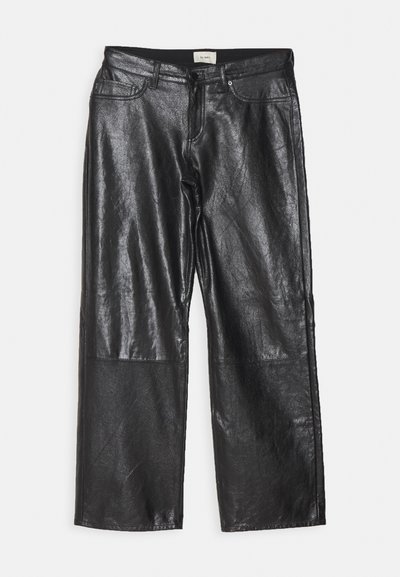 Black, wide-leg pants made from glossy leather. Features two front pockets and stitch accents along the legs. Seamless waistband design.