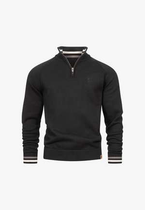 Sweat à zip noir avec une texture côtelée, doté d'un col montant et d'accents rayés aux poignets. Design simple sans logos visibles.