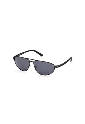 Occhiali da sole aviator neri con lenti grigie, montatura metallizzata sottile, forma curva e naselli in silicone per il comfort.