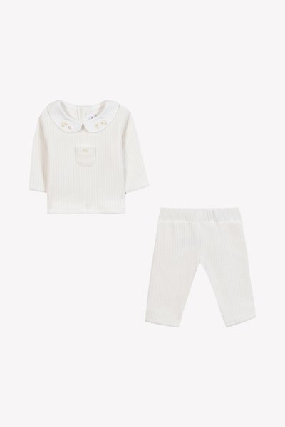 Ensemble à deux pièces rayé blanc composé d'un haut à manches longues avec un col Claudine et une poche poitrine, et d'un legging assorti à taille élastique.