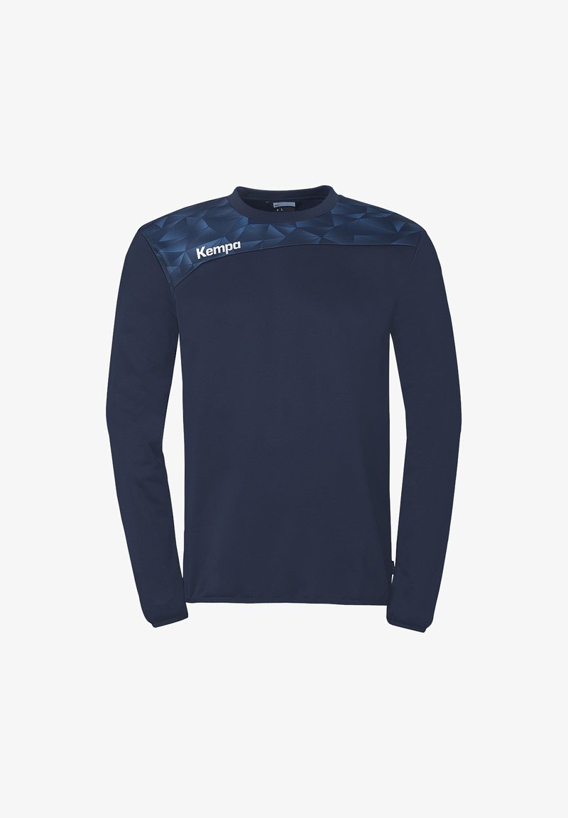 Chemise de sport bleu marine à manches longues avec un panneau d'épaule à motif et le logo blanc "Kempa" sur la poitrine supérieure gauche.