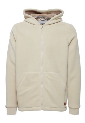 Beige fleecejack met capuchon, voorzien van een ritssluiting aan de voorkant, twee zijzakken en geribbelde manchetten. Zachte textuur, casual ontwerp en een warme voering.