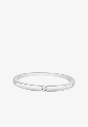 Srebrny pierścionek z gładkim, cienkim obręczą i pojedynczym centralnym diamentem. Projekt jest minimalistyczny z polerowanym wykończeniem.