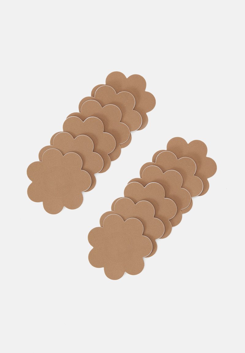 Coasters en forme de fleurs marron avec une texture lisse et des bords festonnés, disposés en deux groupes avec un design uniforme.