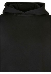 Sweat à capuche noir avec capuche rabattue et devant uni, montrant la texture du tissu et les détails des coutures.