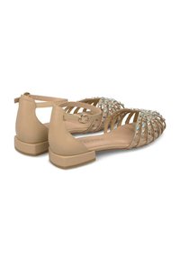 Beige Leder-Sandalen mit offenem Design, dekorativen Strasssteinen und einem niedrigen Blockabsatz. Mit einem Knöchelriemen und einem Schnallenverschluss.