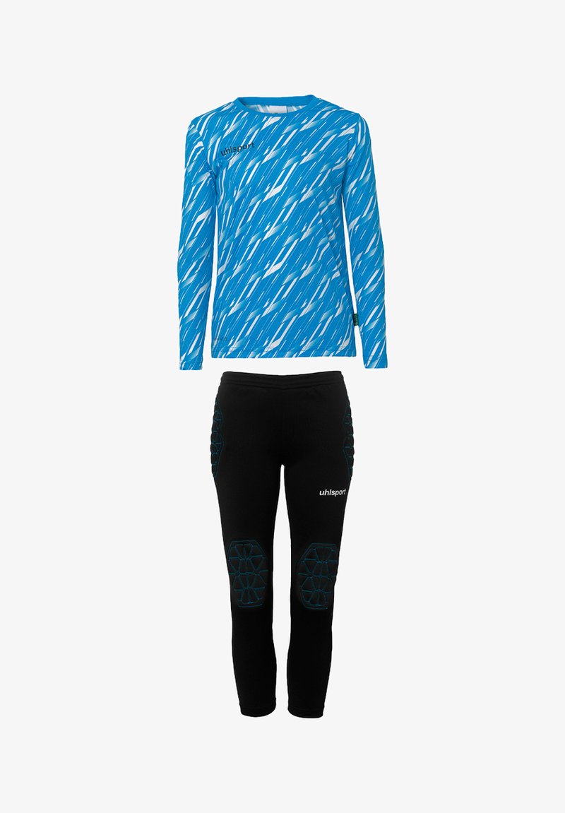 Blå langærmet sportstrøje med hvide diagonale striber og sorte leggings med sekskantet knæpolstring og turkise detaljer.