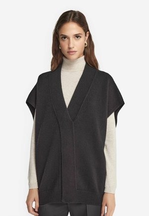 ULTRASOFT CROSSOVER CAPE - Kofta - Black