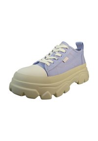 Saucony sneaker, amelynek lila vászon felső része, fehér gumitalpa és krémszínű, texturált talpa van, jól látható, tagolt profillal.