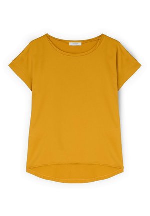 Haut femme manches courtes jaune moutarde avec col rond et ourlet arrière légèrement plus long, design uni.