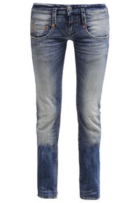 Slim-fit blå jeans i denim, med en urtvättad look, slitna detaljer och klassisk femficksdesign med metallsmycken.