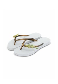 White flip-flops with bronze straps featuring a decorative green lizard adorned with rhinestones on each strap. Textured footbed.