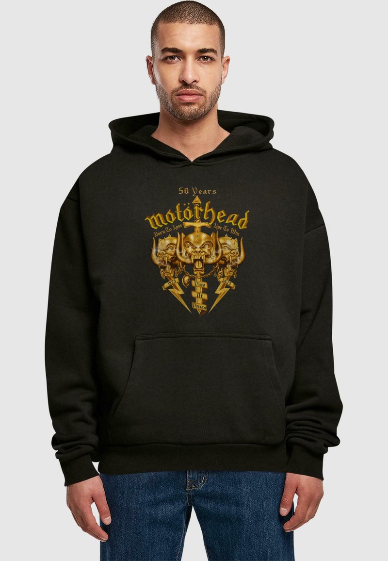 Felpa nera in cotone, con una grafica centrale dorata che presenta il logo Motorhead e teschi, tasca a marsupio e polsini a coste.