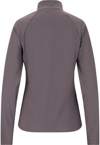 Pitkähihainen urheiluupotu muted-harmaana, jossa on mock-collar ja raglan-hihat. Sileä kangas, jossa on minimaalinen ompelutyyli.