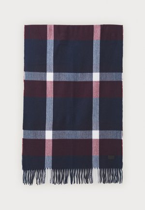 Plaid scarf in navy, burgundy, and gray. Soft material with fringed edges and a rectangular shape. Notable for its checkered pattern.