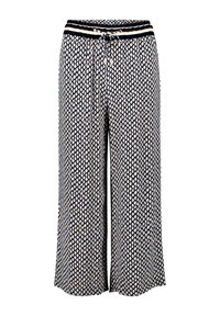 Gemusterte weit geschnittene Hose in Marineblau und Creme mit einem Kordelzugbund, der kontrastierende Streifen aufweist, und aus einem leichten, glatten Stoff gefertigt.