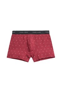 Boxer bóxer masculinos en color marrón con pequeños puntos florales blancos, cinturilla elástica negra con el texto "YSABEL MORA" en blanco.