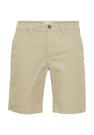 Bež kratke hlače od teksturirane tkanine, s patentnim zatvaračem i jednim smešnim dugmetom. Ravnog kroja s bočnim džepovima.