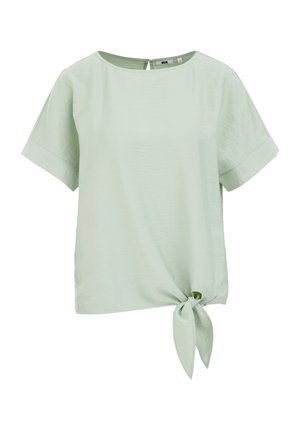 Haut vert clair à manches courtes avec un encolure ronde, détail de lien à l'avant et coupe décontractée. Texture lisse et coutures minimales visibles.