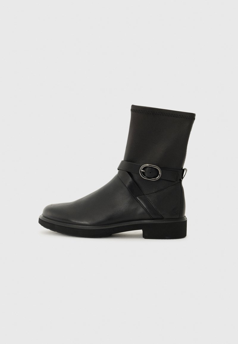Black ankle boots with a smooth leather finish, elastic top, and a decorative strap with a silver buckle. Rectangular toe shape and flat sole.