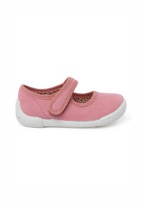 Pink canvas shoe with a gripping white sole, circular toe design, and a Velcro strap across the instep for adjustable fit.