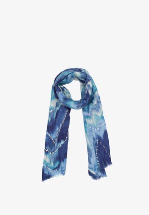 Sciarpa leggera nelle tonalità di blu, con un motivo a onde. I bordi sono sfilacciati, con sottili accenti dorati sparsi nel design.