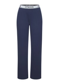 Námornícke modré tepláky s širokým elastickým pásom, na ktorom je biele písanie "CPNHGN", rovný strih a jemný, hladký materiál.