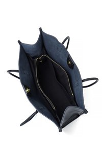 Black leather tote bag with an open top, featuring a dark blue suede interior, two side pockets, and a central zipped compartment.