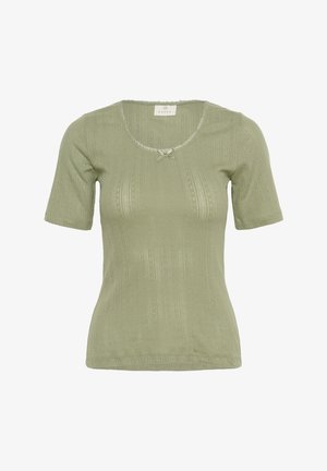 Haut vert clair à manches courtes avec un décolleté en forme de cœur, en tissu texturé, avec une bordure en dentelle et un petit nœud au centre devant.