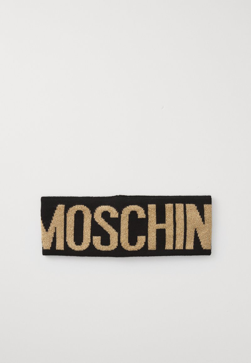 Fascia per capelli nera lavorata a maglia con il nome del marchio "MOSCHIN" in lettere dorate in grassetto. Il materiale ha una texture liscia.