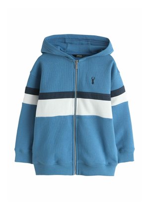 Mėlynas džemperis su užtrauktuku, juodos ir baltos horizontalių dryžių per krūtinę ir rankoves, kairėje krūtinėje mažas juodas elnio logotipas.