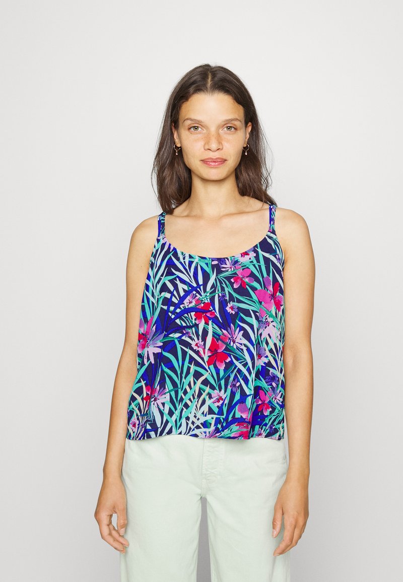 Top de alças com estampa floral em azul-marinho, com folhas e flores tropicais multicoloridas. Apresenta alças finas e um corte descontraído e solto.