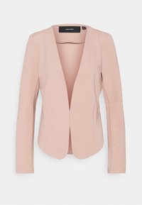 Blazer rose blush à manches longues en tissu lisse. Il présente un décolleté en V profond et une coupe ajustée avec des détails de couture minimalistes.