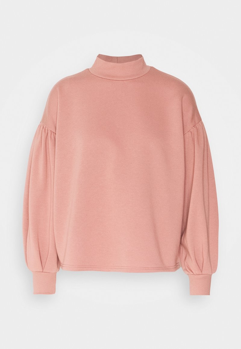 Sweat-shirt rose à col montant, manches volumineuses, poignets côtelés et texture lisse et douce. Design simple et épuré.