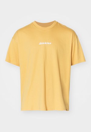 T-shirt en coton jaune avec manches courtes, design à col rond, présente le logo blanc "Dickies" à l'avant. Texture douce, coupe décontractée.